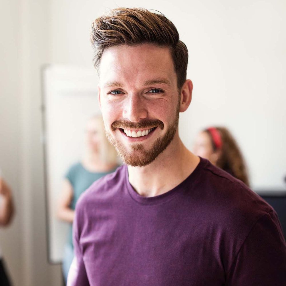 smiling-young-designer-using-his-cellphone-after-a-MBE827T.jpg smiling-young-designer-using-his-cellphone-after-a-MBE827T.jpg